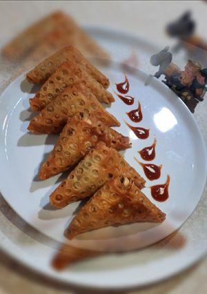 عکسی از دستور سمبوسه هندی +پیچیدن