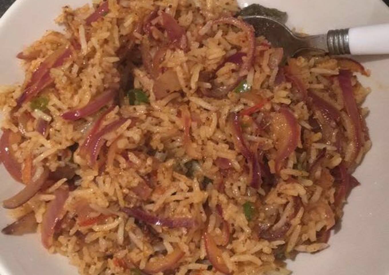 Fried rice with onions and chili