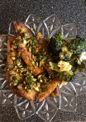 A picture of Fish 🐟 Tilapia and Ginger-Roasted Cheese 🧀 Broccoli 🥦.