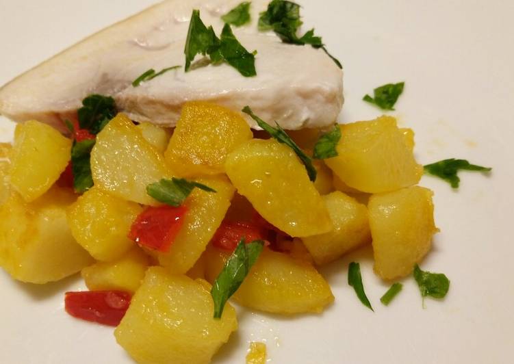 Pan fried swordfish with peppers and potatoes