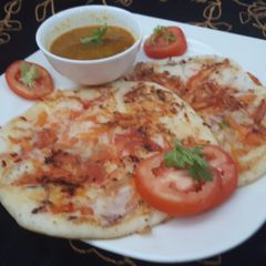 Tomato Carrot Uttapam A picture of Tomato Carrot Uttapam.