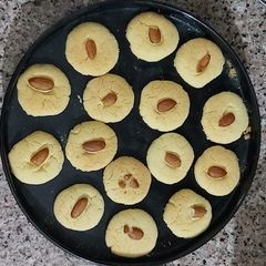 A picture of Baked nankhatai in oven.