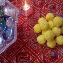A picture of Kesariya Coconut laddu.
