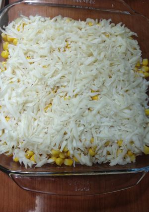 Una foto de Ensalada de elote, piña y queso