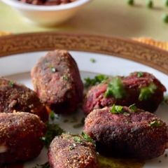 A picture of Beets Peas and Carrots Croquettes.