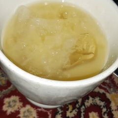 A picture of Fresh Orange and ginger drink.