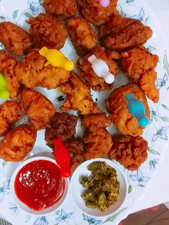 A picture of AL-BAIK fried chicken.