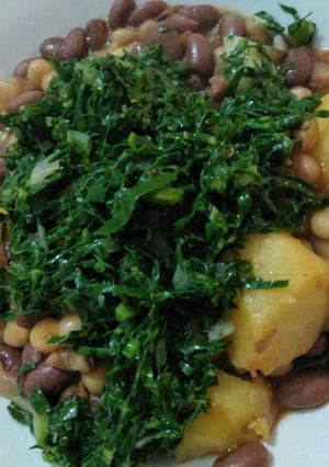 A picture of Stewed potatoes githeri with greens.