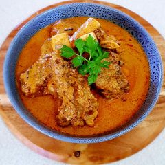 A picture of GULAI BAGAR IGA SAPI (Beef Ribs Bagar Curry).