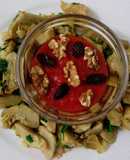 Alcachofas al ajillo y crema de pimientos y tomates asados con frutos secos