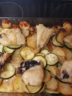 Una foto de Merluza al horno con patatas
