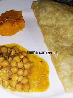 A picture of Halwa puri channay.