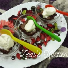 A picture of Fudgy Chocolate Brownies with Ice-cream.