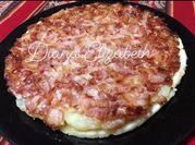 Una foto de crujiente de queso brie