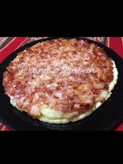 Una foto de Tatin de papas, panceta y queso brie. 👩🏼‍🍳