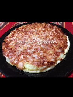 Una foto de Tatin de papas, panceta y queso brie. 👩🏼🍳