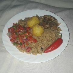 A picture of Tomato Paste Pilau #festivedishcontestkakamega#authormarathon#.