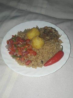 A picture of Tomato Paste Pilau #festivedishcontestkakamega#authormarathon#.