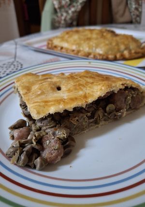 A picture of Fava Bean and Sausage Empanada.