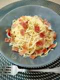 Spaghetti con piñones y jamón crunch