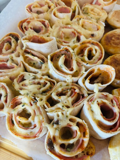Una foto de Rollitos de jamón y queso