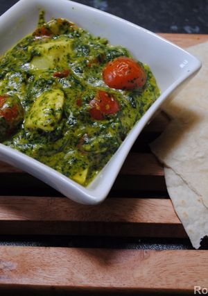 A picture of Spinach puree with Halloumi cheese.
