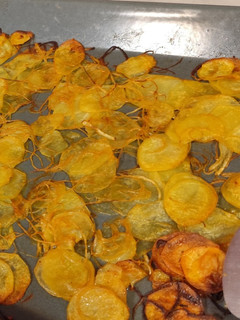 Una foto de Patatas con cebolla