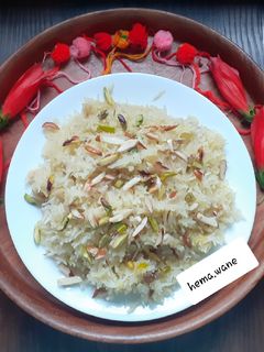 नारळी भात (narali bhaat recipe in marathi) रेसिपी चे मुख्य फोटो