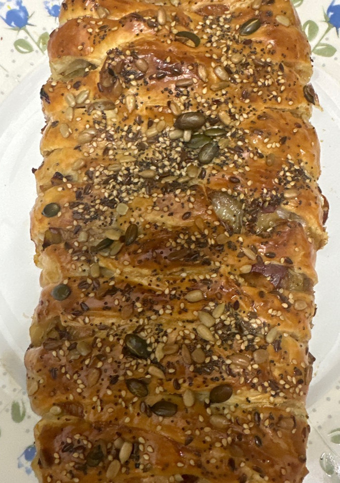 Una foto de 602. Trenza de puerros y queso de cabra (entrante)