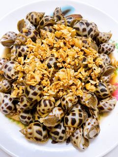 Hình của món Ốc hương xào bơ tỏi.