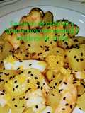 Ensalada tibia de calamar, langostinos, patatas y con emulsión de vinagreta de limón