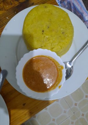 A picture of Peanut stew and matoke.