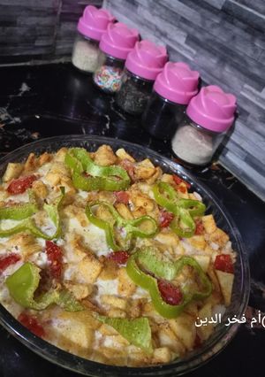 صورة لوصفة غراتان البطاطا المقلية بالطماطم😋