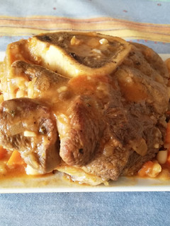 Una foto de Osso Bucco estofado a la mandarina🍊