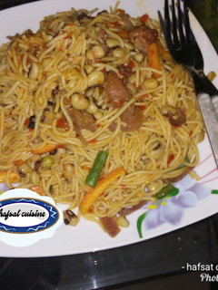 A picture of Beans and spaghetti jollof.