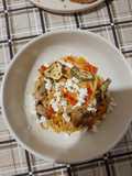 Spaghetti con crema de pimientos y champiñones