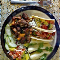 A picture of Tacos, Pork and Salad.