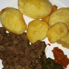 A picture of Roasted potatoes with wet fried liver.