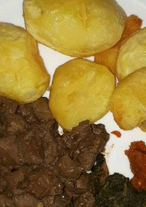 A picture of Roasted potatoes with wet fried liver.