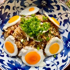 Fried Rice with Small Fried Eggs A picture of Fried Rice with Small Fried Eggs.