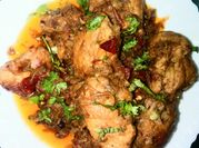 A picture of tomato stew with leaf