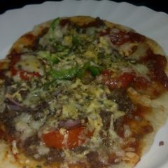 A picture of My Own Pizza#Authorsmarathon#FestivecontestMombasa#.