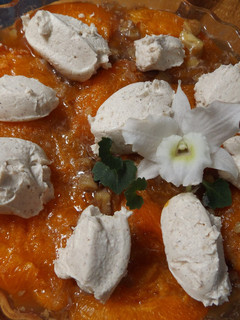 Una foto de Albaricoques asados al whisky con crema de mascarpone