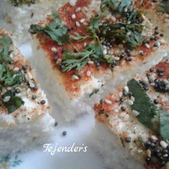 White dhokla made of dosa batter A picture of White dhokla made of dosa batter.