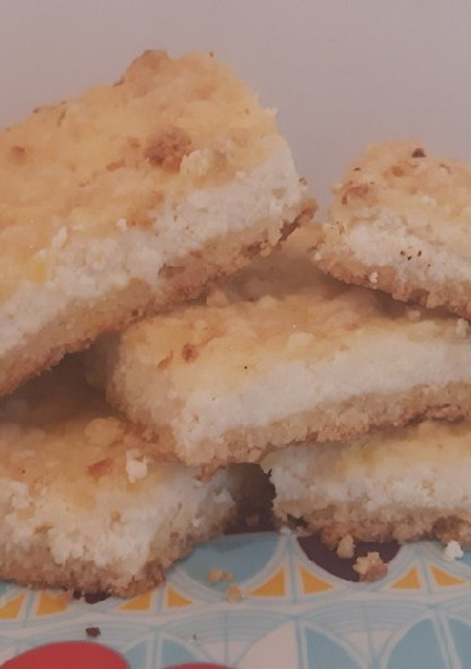 Una foto de Cuadraditos crumble de ricota