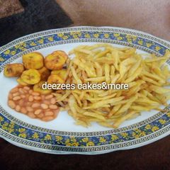 A picture of Irish/plantain with baked beans.