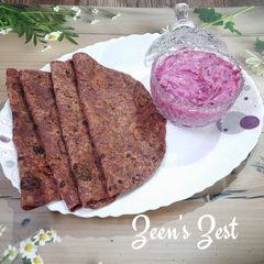 A picture of Beetroot Rotis/Chapatis with Beetroot Onion Raita.