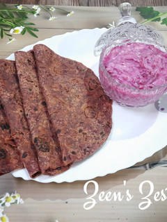 A picture of Beetroot Rotis/Chapatis with Beetroot Onion Raita.