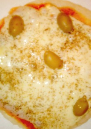 Una foto de Pizza 🍕 de arroz a la sartén!! 👌👌👏👏👏👏