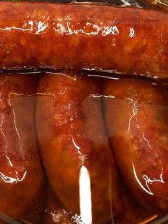 Una foto de Chorizos frescos confitados
